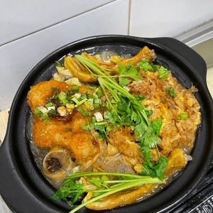 A Lun Duck Feet and Snail Stew with Rice Noodles