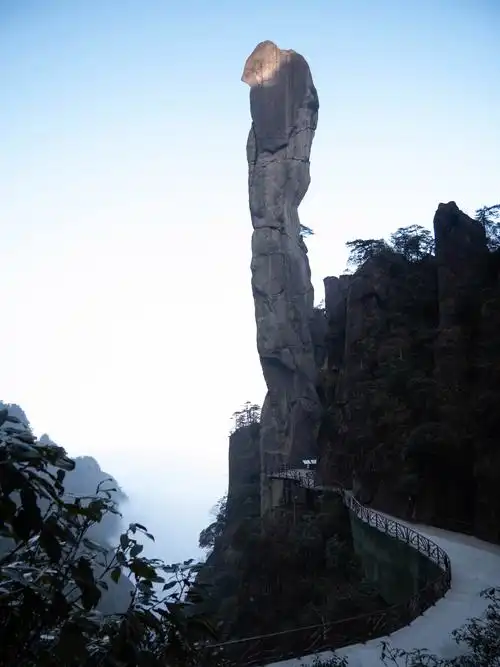Giant Python Emerging from the Mountain