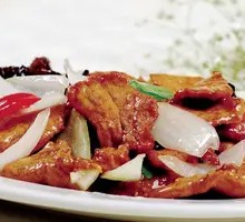 Onion Stir-Fry with Pork over Noodles
