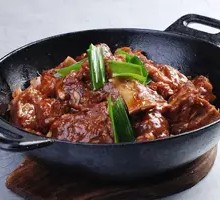 Stir-Fried Pork Ribs and Chicken in Iron Pot