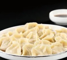 Braised Tofu Puffs with Cabbage and Meatballs
