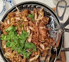 Grilled Meat on Iron Skillet