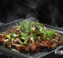 Grilled Meat on Iron Skillet