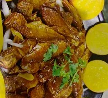 Pan-fried corn cakes with small fish stew
