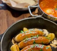 Apple Cider-Braised Spanish-Style Sausage