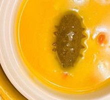 Signature Golden Soup with Rock Rice and Flower Gelatin