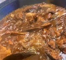 Stewed Bighead Carp in Iron Pot