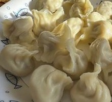 Fried Pork Scraps with Sour Cabbage Dumplings