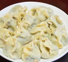 Fried Pork Scraps with Sour Cabbage Dumplings