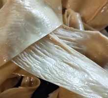 Oil-soaked tofu skin