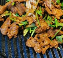 Grilled Meat on Iron Skillet