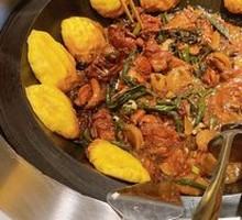 Stewed Rooster in Iron Pot