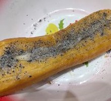 Oil-fried dough wrapped in rice cake