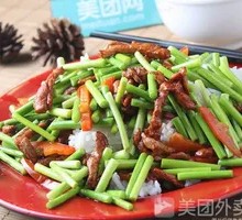 Stir-fried Garlic Shoots with Pork over Rice