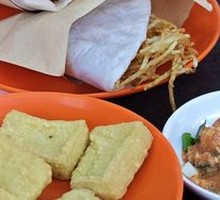 Stir-fried rice cake with potato strips