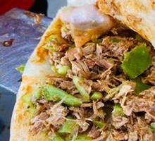Meat-filled flatbread roll