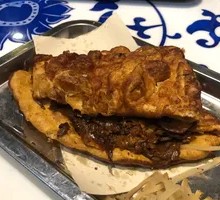 Meat-filled fried flatbread