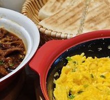 Bird's Nest and Egg in Clay Pot