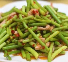 Stir-fried shredded pork with garlic shoots