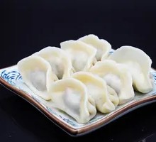 Handmade Pork and Scallion Dumplings