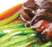 Braised Mushrooms with Tender Greens