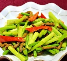 Stir-fried garlic shoots with pork