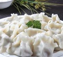 Fried Pork Scraps with Sour Cabbage Dumplings