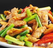 Stir-fried garlic shoots with pork