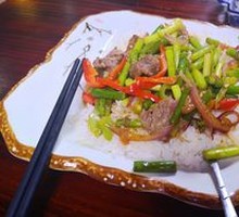 Garlic Shoot Stir-Fry with Pork over Rice