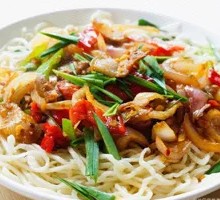 Onion Stir-Fry with Pork over Noodles