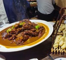 Stewed Rooster in Iron Pot