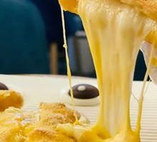 Golden Oozing Pizza