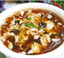 Tofu pudding with spicy soup