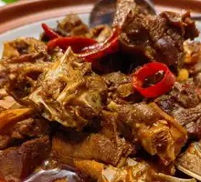Sautéed Duck with Ginger and Chili in Clay Pot