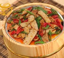 Fried Tofu and Meat in Wooden Bucket Rice