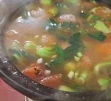 Tomato and Greens Meatball Soup
