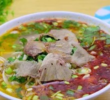Hand-extruded noodle soup