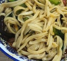 Hand-extruded noodle soup
