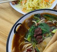 Hand-extruded noodle soup