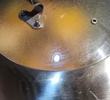 Stewed Rooster in Iron Pot