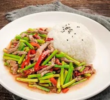 Stir-fried Garlic Shoots with Pork over Rice