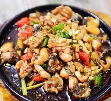 Sizzling Frog Legs