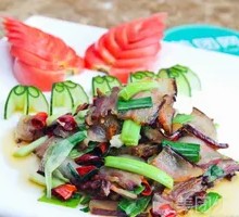 Braised Garlic Shoots with Preserved Meat