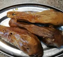 Braised Duck Heads in Spiced Sauce