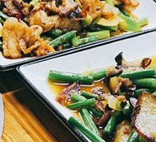 Braised Garlic Shoots with Preserved Meat