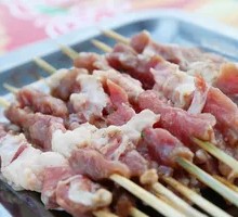 Lamb Skewers on Red Willow Branches