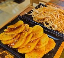 Grilled Potato Slices on Iron Plate