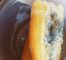 Oil-fried dough wrapped in rice cake