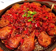 Spicy Duck Heads on Iron Plate