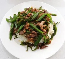 Stir-Fried Pork with Green Peppers over Rice